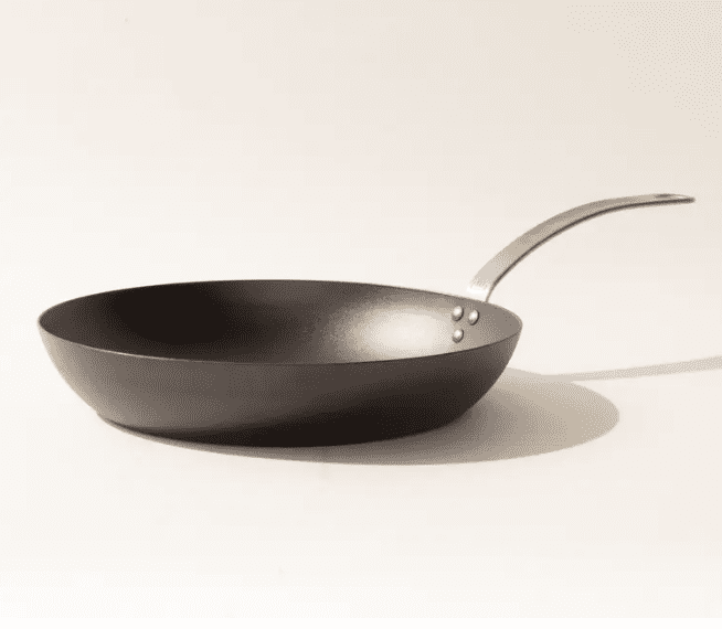 blue carbon steel frying pan