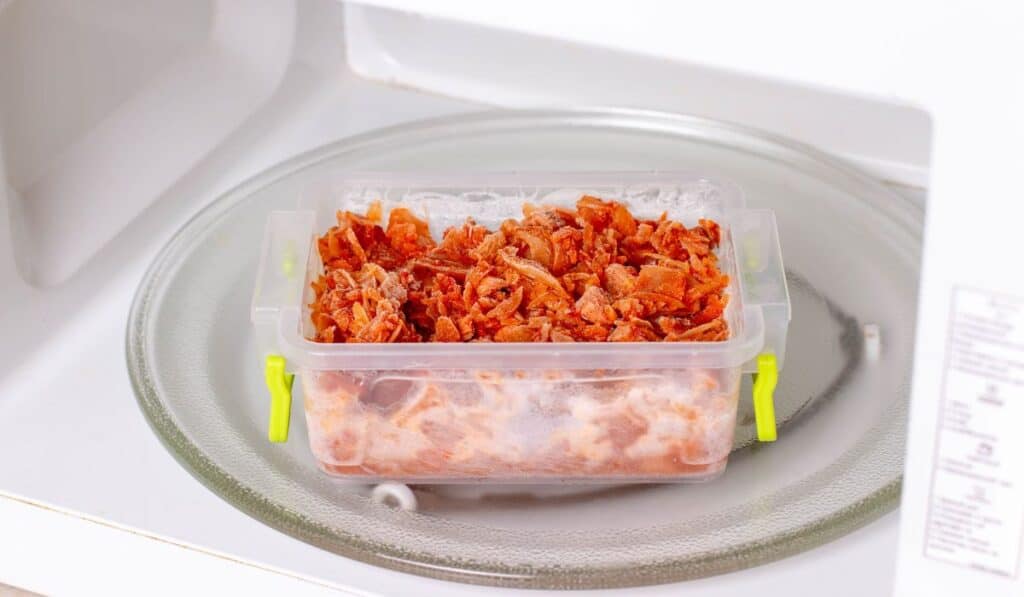 food in a polypropylene container in a microwave