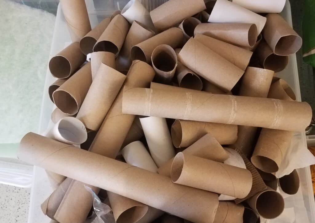 a bin of paper towel rolls