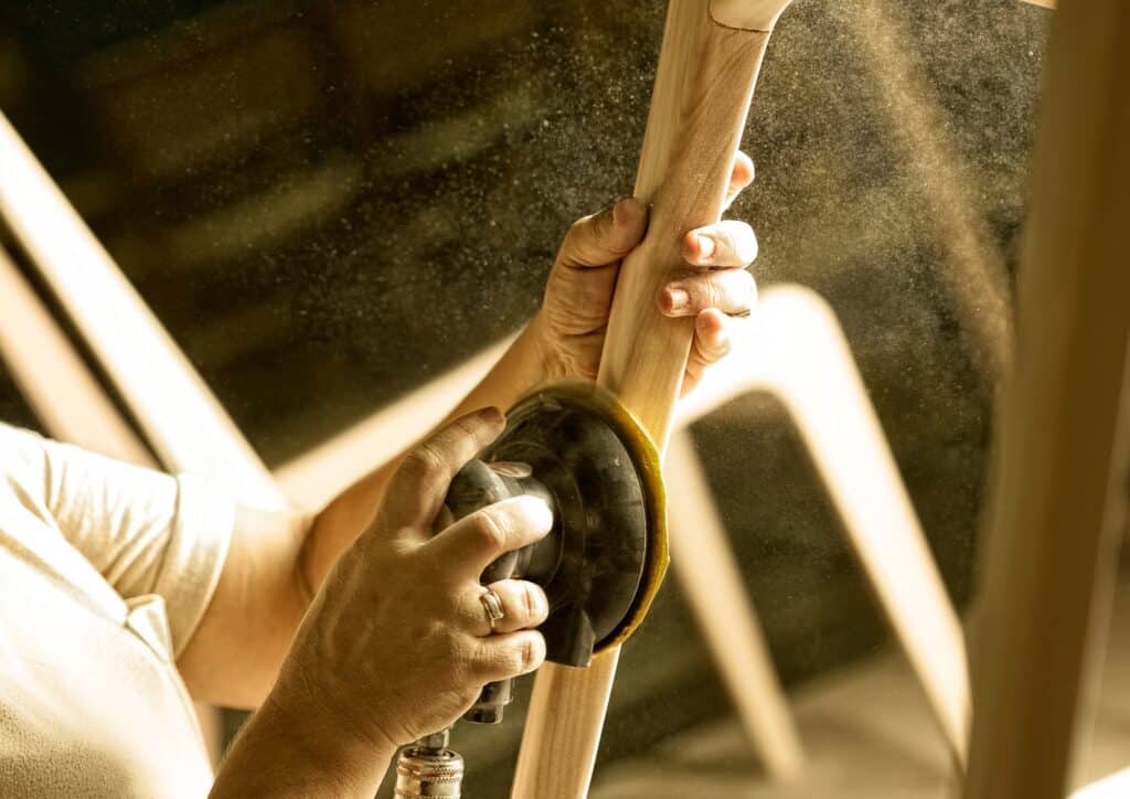 carpenter handcrafting wood furniture