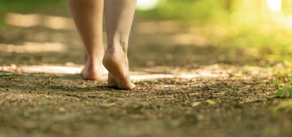 a person barefoot outside