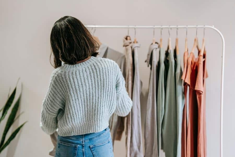 a woman shopping for organic clothing