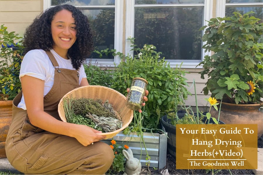 a picture of me holding herbs that I hung dried