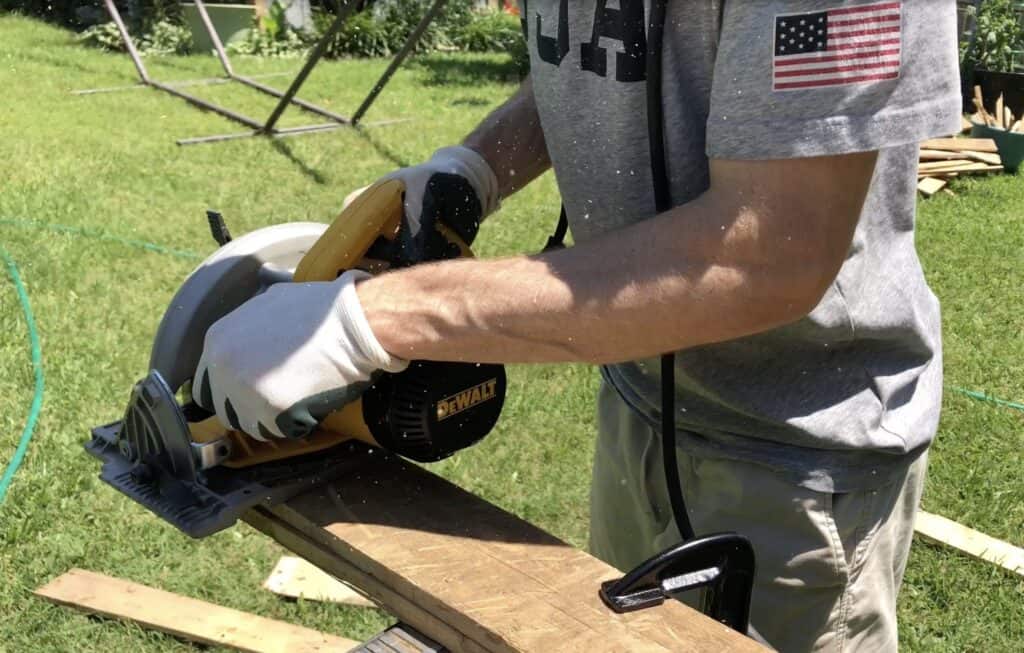 cutting wood with a saw