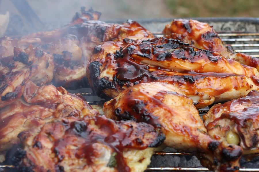 Chicken cooking on a grill