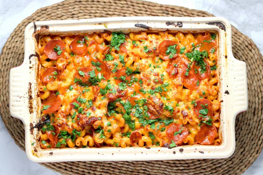 ceramic pan with baked macaroni and cheese in it