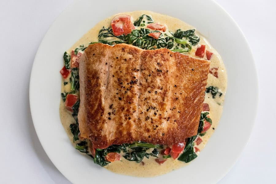 Cooked Salmon and vegetables on a plate