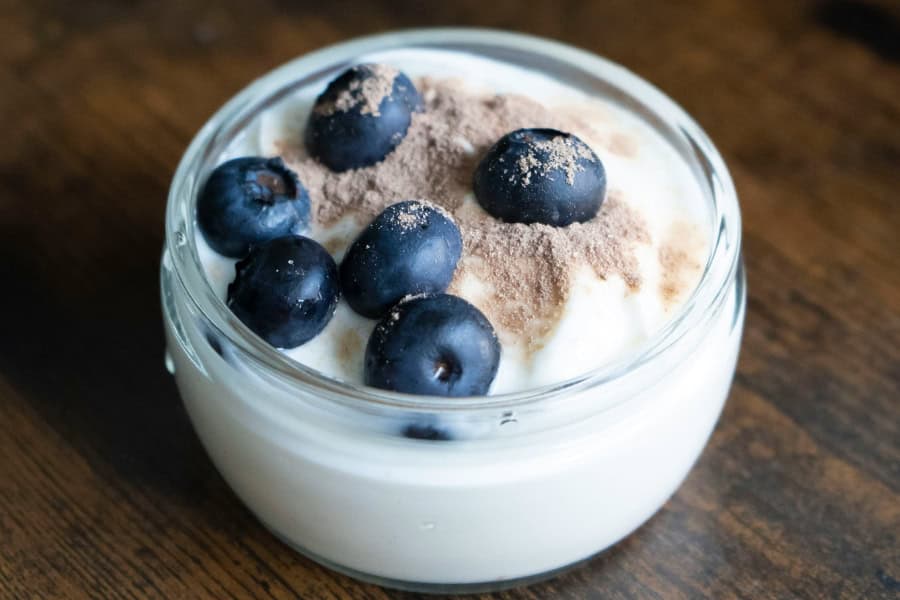 yogurt with blueberries on top