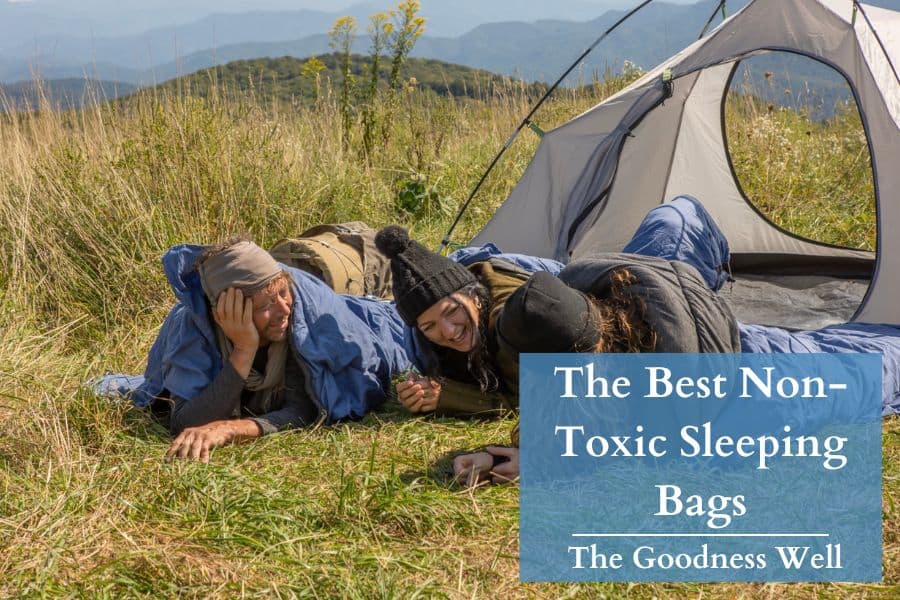 3 people lying on the ground in sleeping bags