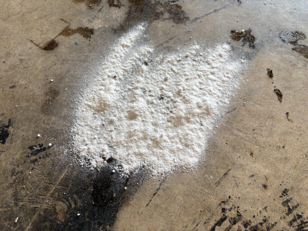 baking soda covering an oil spot