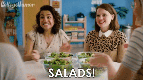 women eating salads