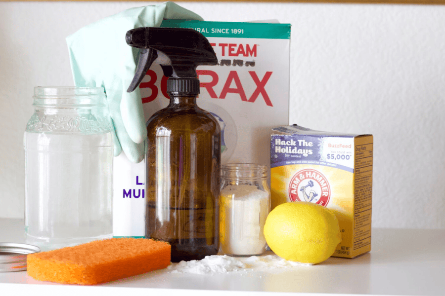 a collection of natural cleaning ingredients- baking soda, borax, castile soap