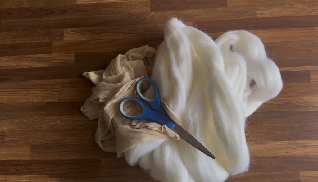 wool, pantyhose and scissors 