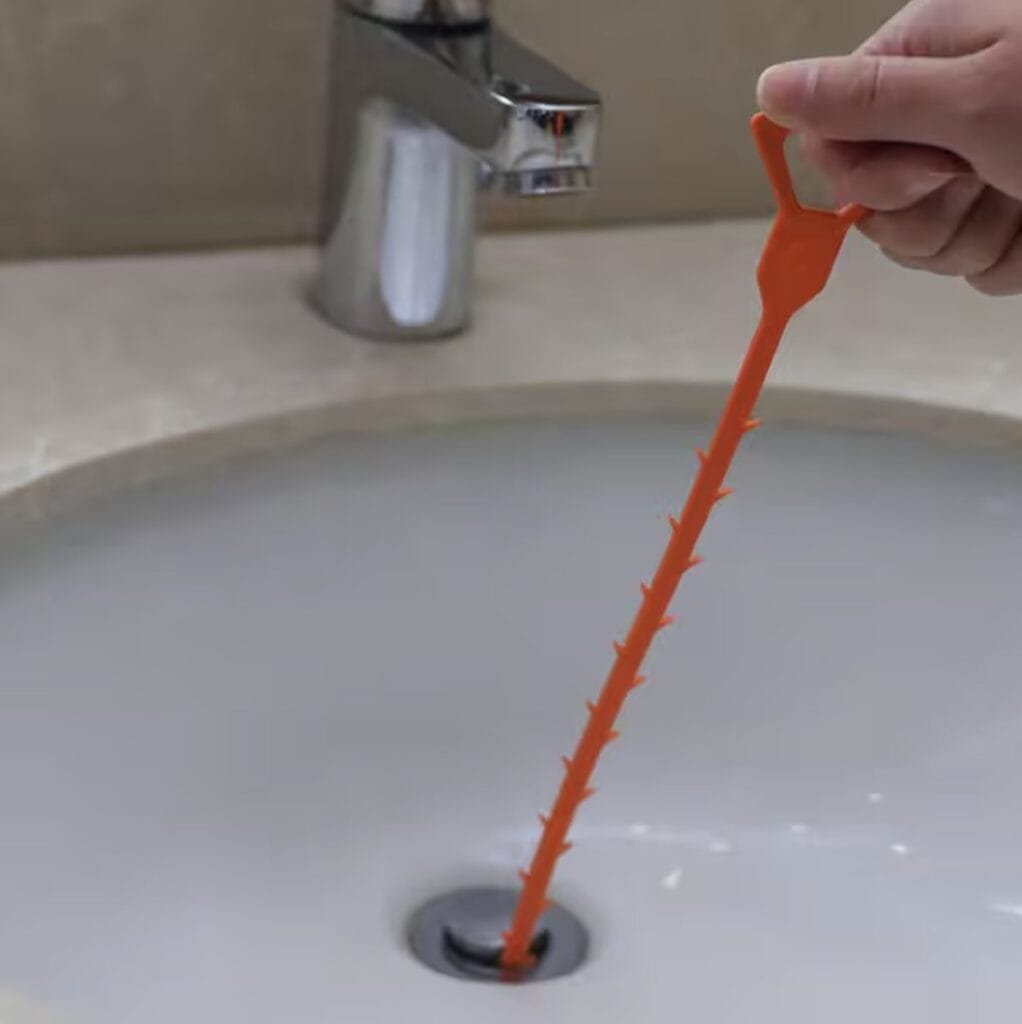 using a drain snake