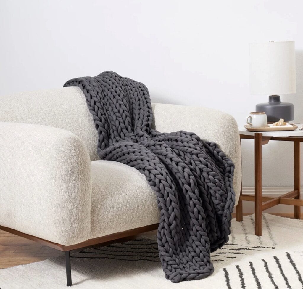 a weighted blanket on a couch