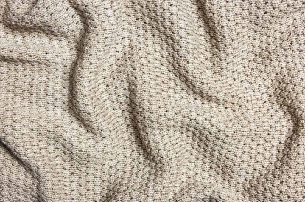 a close up of a cotton blanket