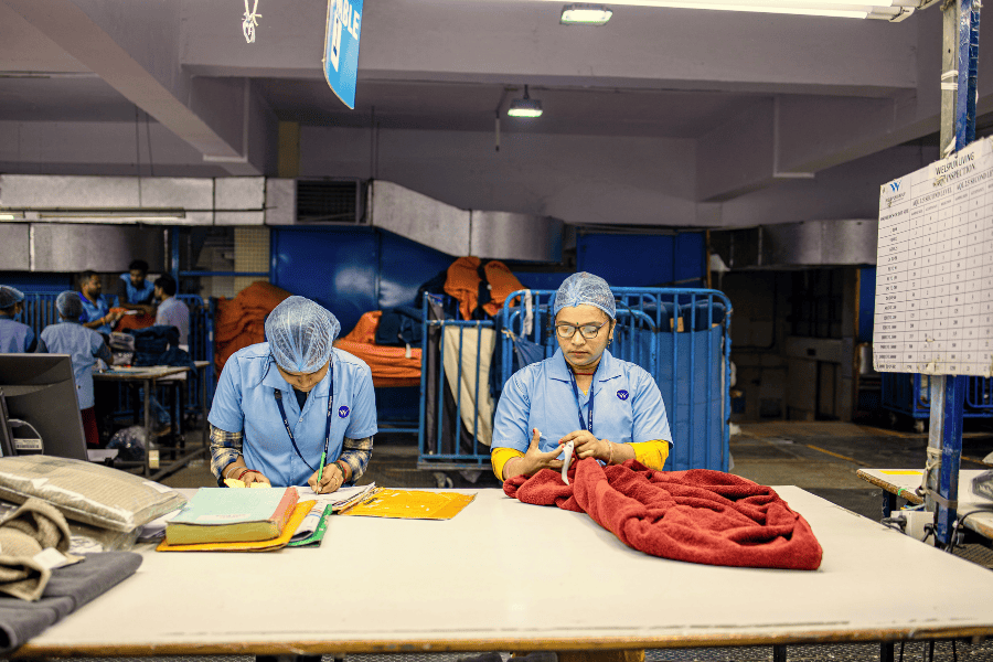 two women working in a factory 