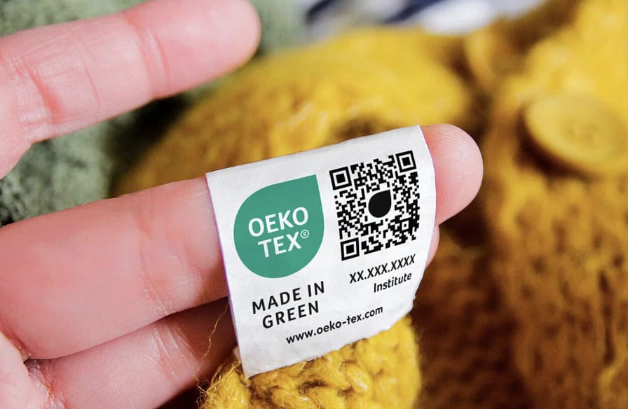 oeko tex made in green tag on a sweater
