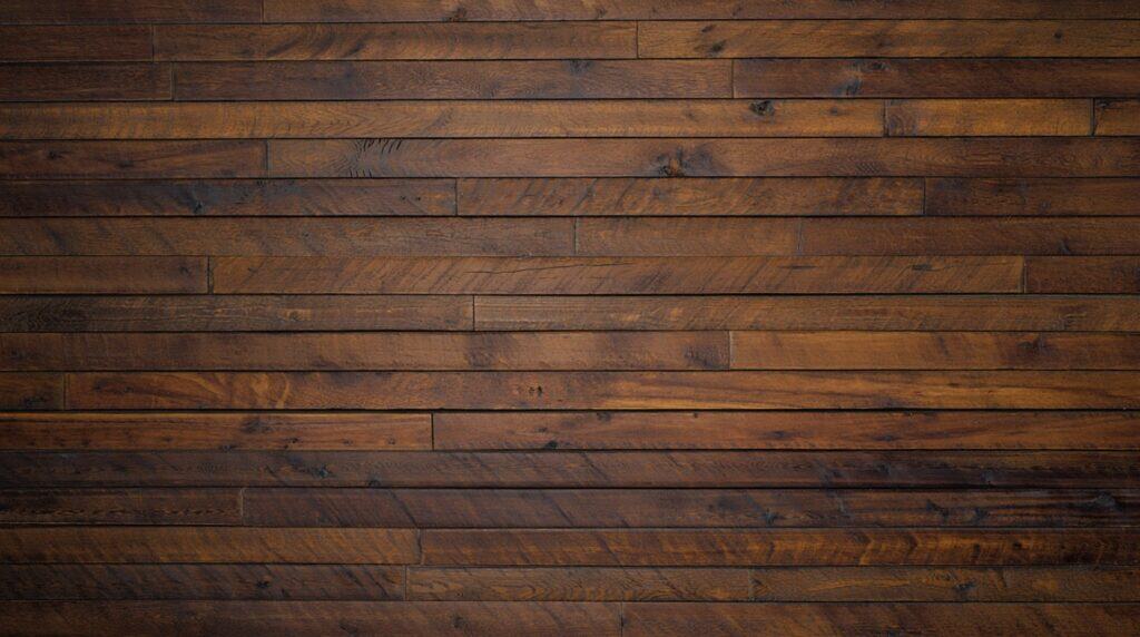 Close-up of dark stained wood planks showing natural grain and panel construction