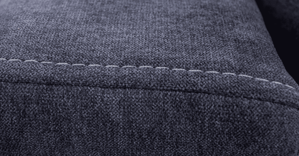 Close-up of dark textured couch upholstery fabric