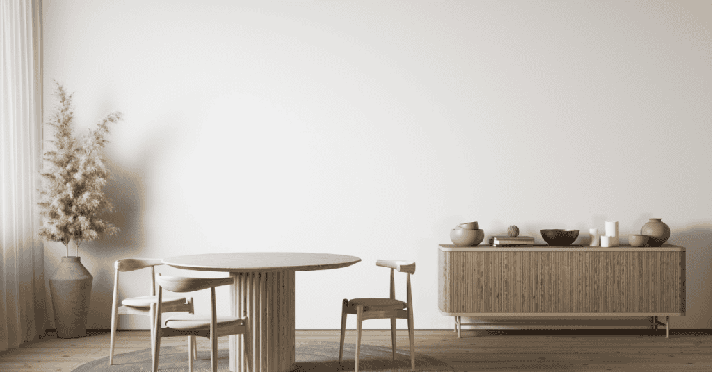Dining chair and large wooden dresser in a neutral home interior