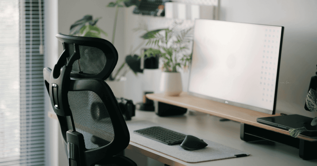 Modern ergonomic office chair at a clean home office desk.