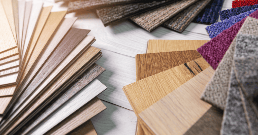 Wood, fabric, and carpet samples arranged for comparing furniture materials.