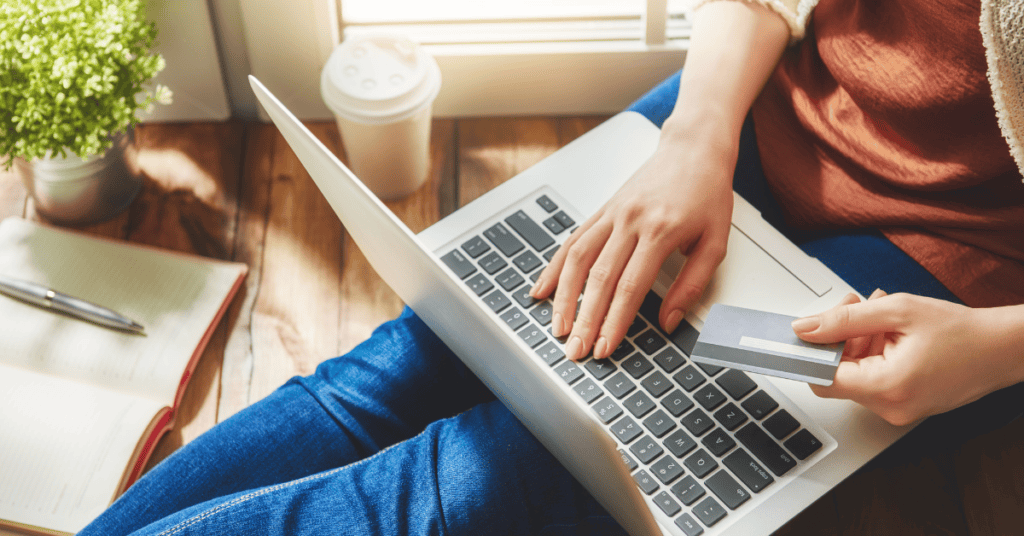 shopping for furniture online using a laptop