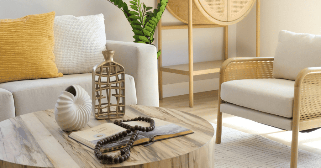 Natural living room with wood furniture, neutral upholstery, and indoor plants