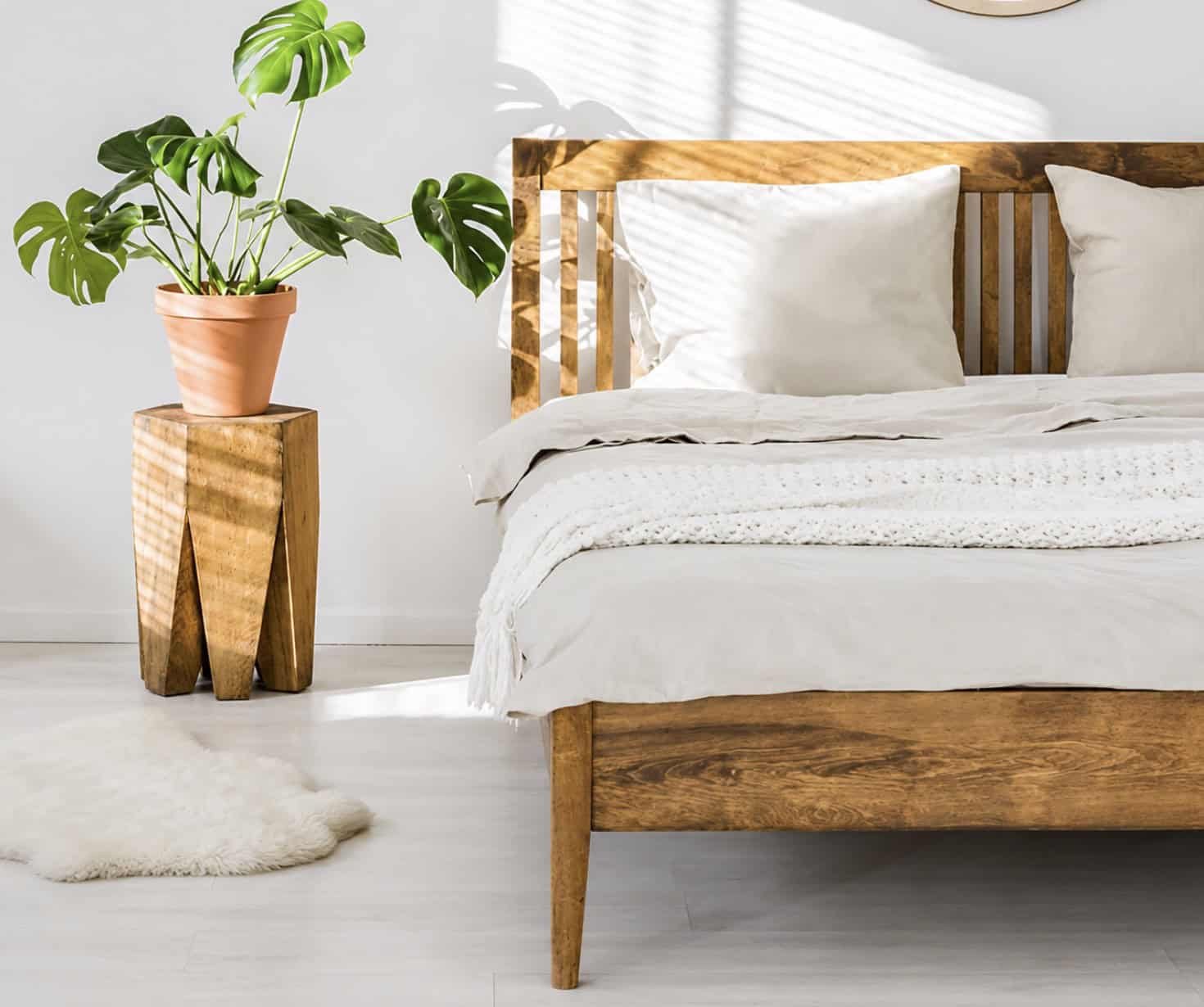 Minimalist bedroom featuring a solid wood bed