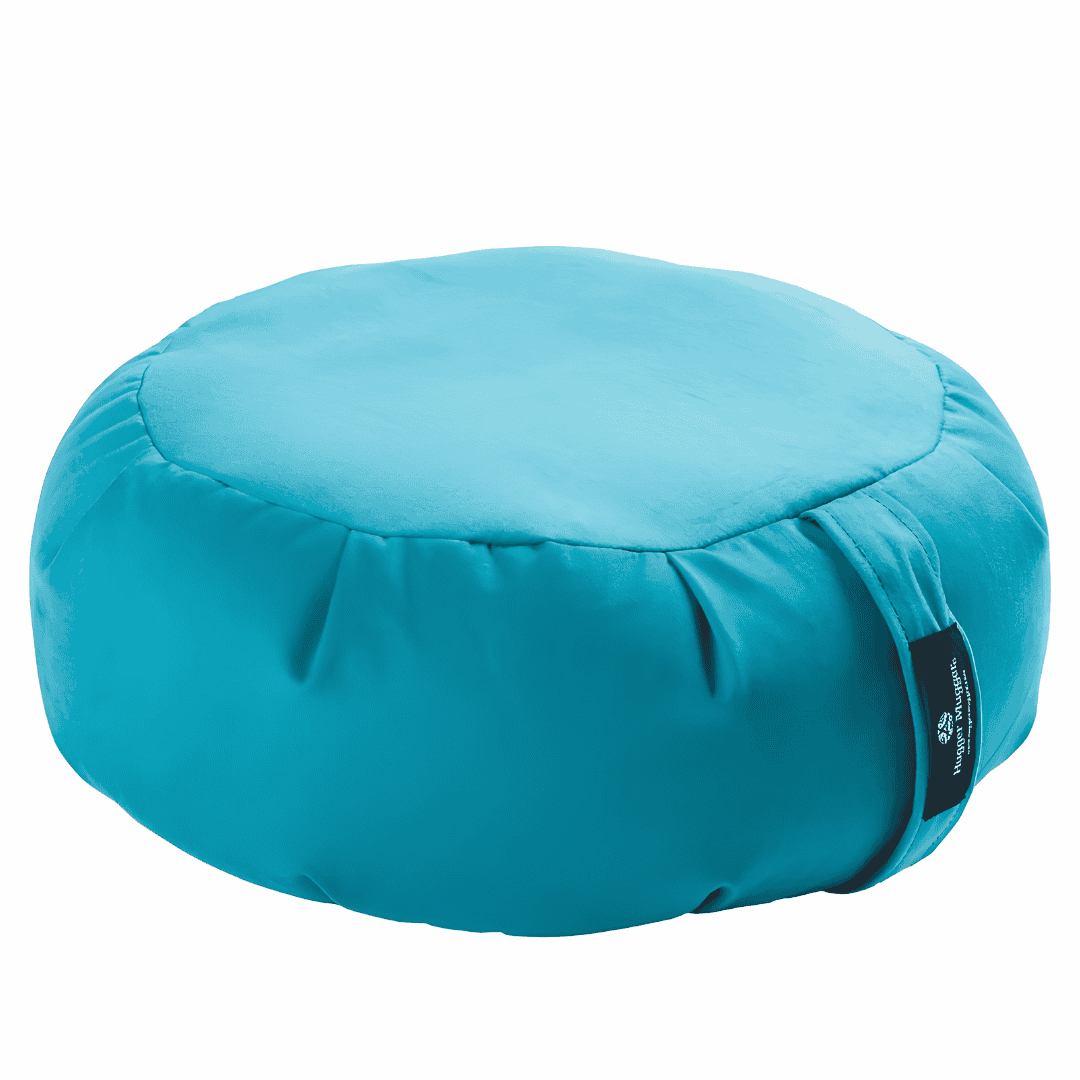 Turquoise round Hugger Mugger meditation cushion with a carrying handle.